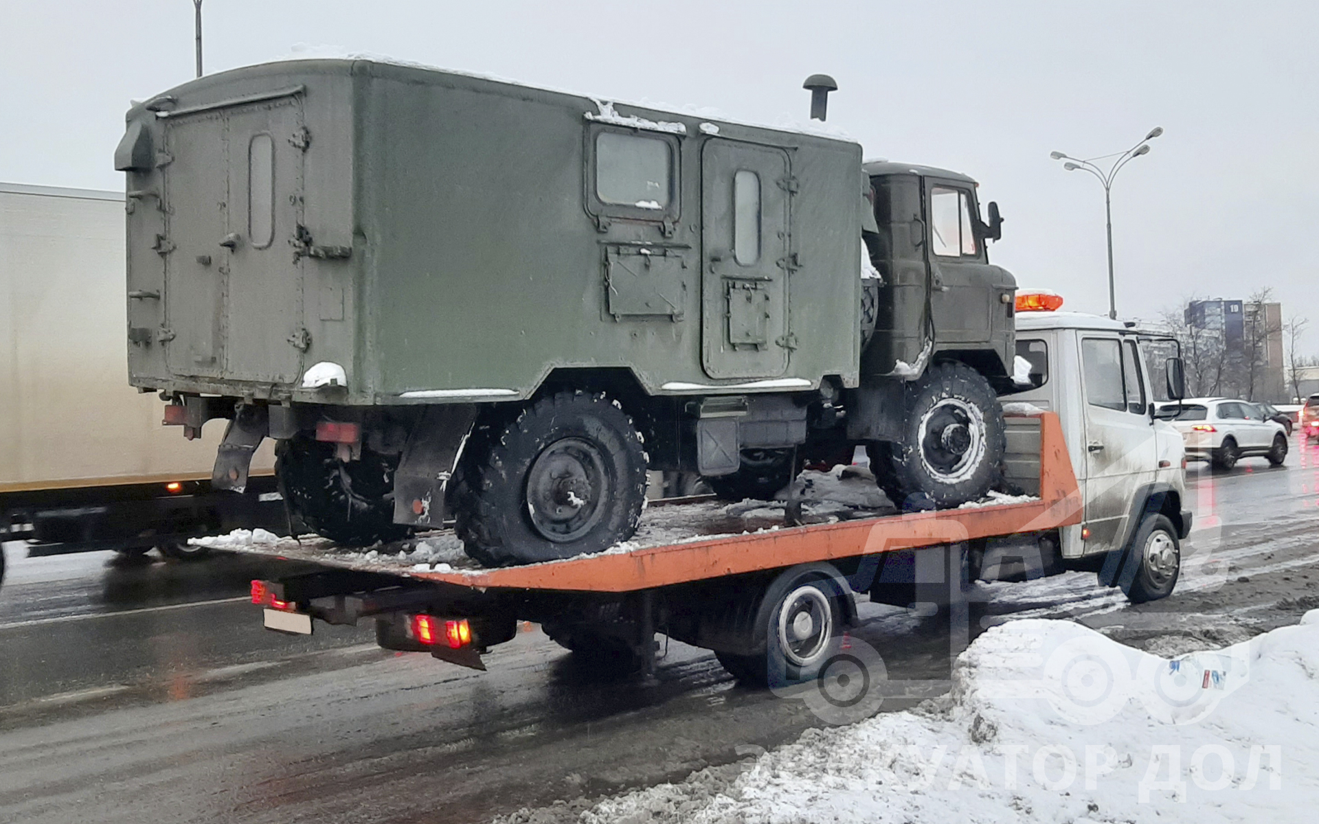 Перевозка грузового автомобиля ГАЗ-66 КУНГ - Эвакуатор ДОЛ